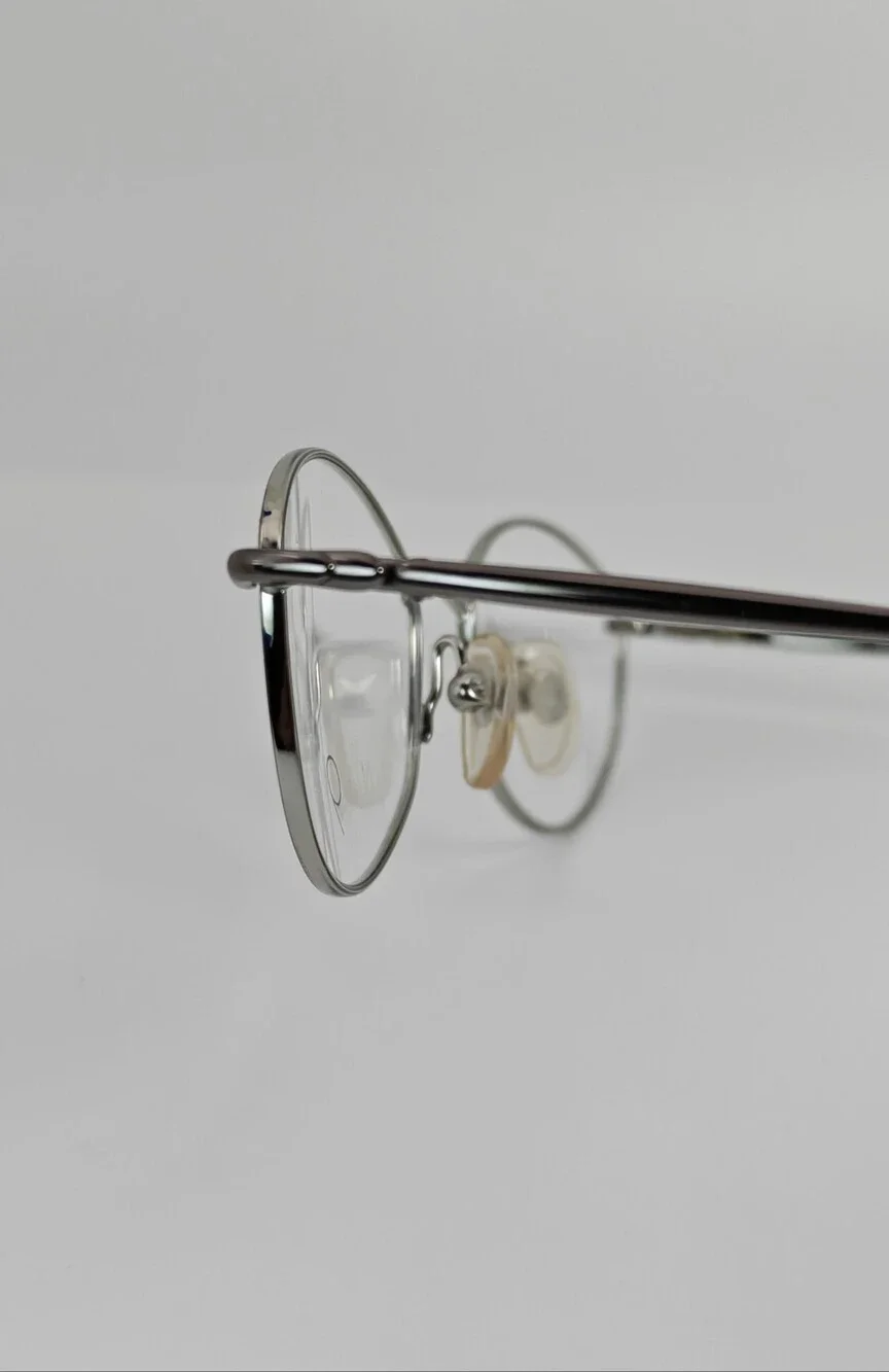 Nine West. 308. Silver Oval Wireframe. Ivory Grey Tortoise Front.